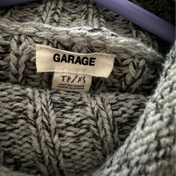 Black and white knit sweater. Only worn a few times. Great condition - Picture 2 of 3